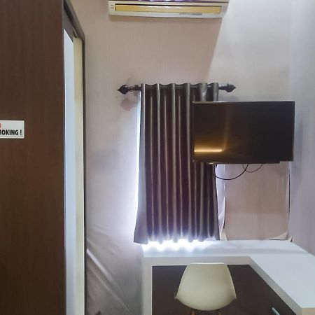 ホテル Reddoorz Syariah Near Sultan Syarif Kasim II Airport プカンバル エクステリア 写真