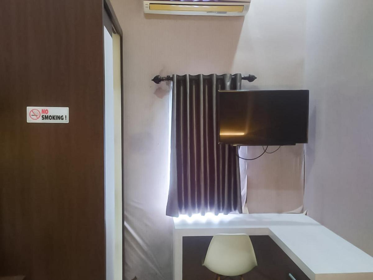 ホテル Reddoorz Syariah Near Sultan Syarif Kasim II Airport プカンバル エクステリア 写真