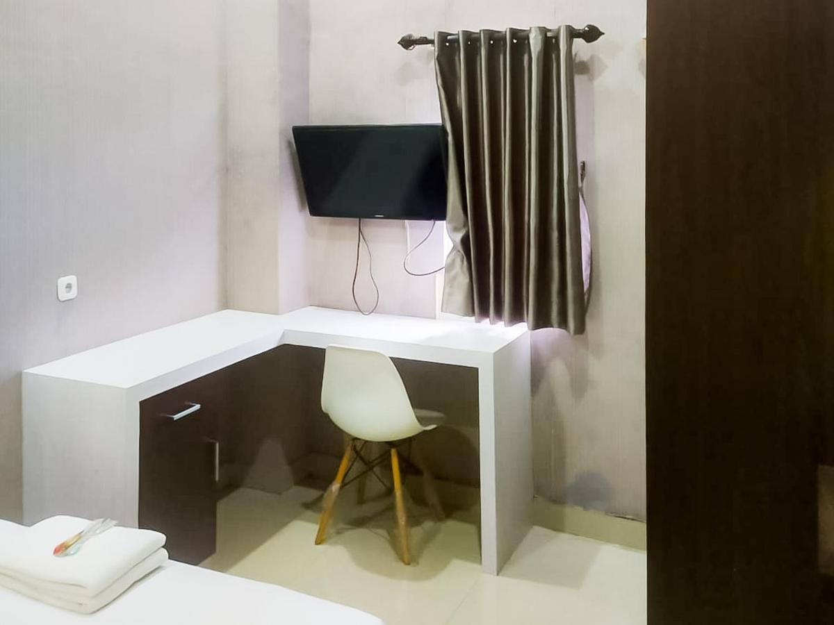 ホテル Reddoorz Syariah Near Sultan Syarif Kasim II Airport プカンバル エクステリア 写真